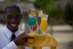 Man Standing with Drinks at the beautiful Jewel Dunn's River