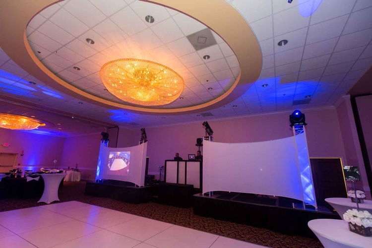 Prom dance floor with lighting and disco ball effects organized by Houston Event Planning