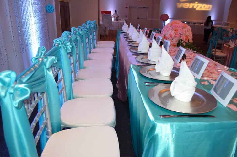 Table setting with ornate place cards and personalized party favors for a Quinceañera done by Houston Event Planning