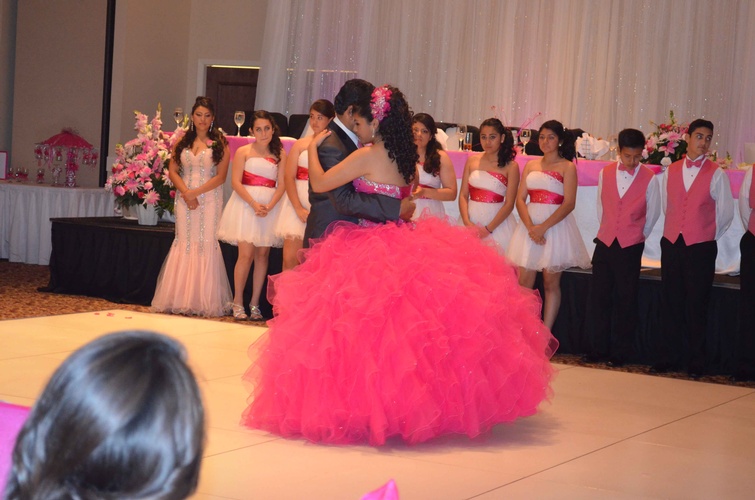 Quinceañera court performing a choreographed dance routine captured by Houston Event Planning