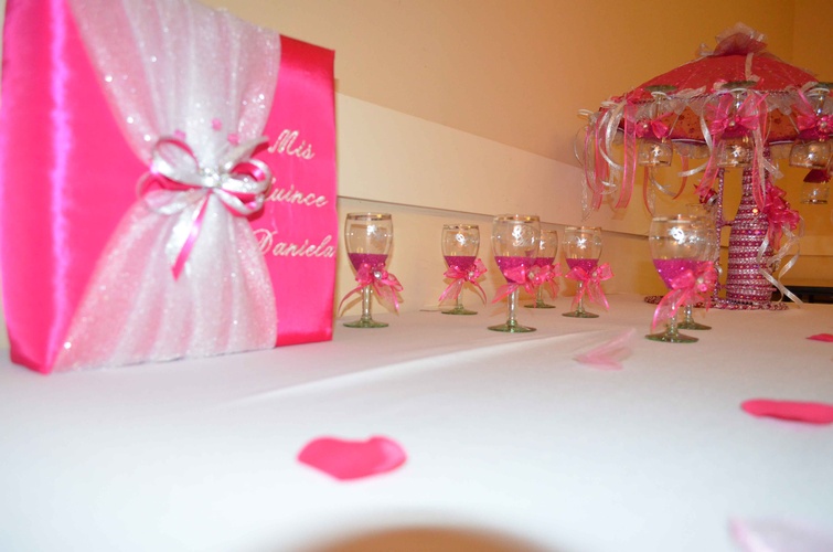 Decorative arrangements and table settings for Quinceañera celebration done by Houston Event Planning