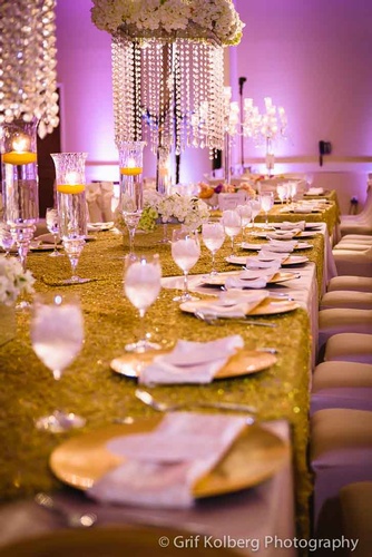 Elegant wedding reception table setup with floral centerpieces done by Houston Event Planning