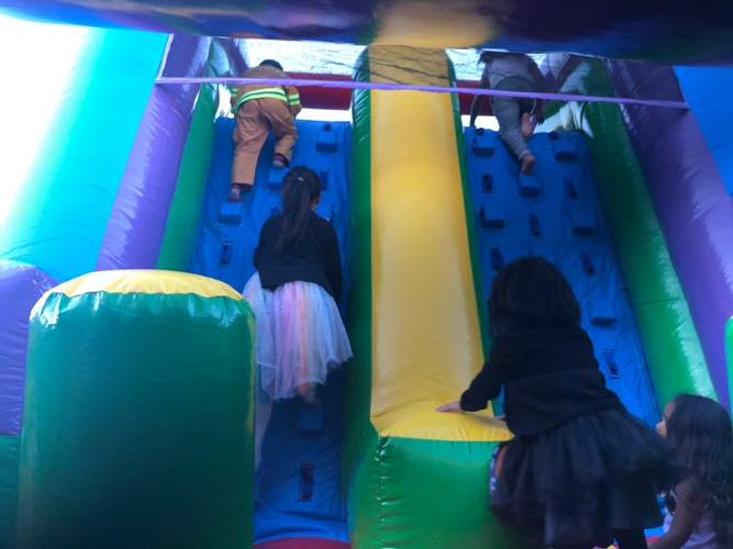 Community Event Planning with fun bouncey for the kids to play around