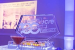 Corporate Event sign with ice sculpture promoting 100 years of the company organized by Houston Event Planning