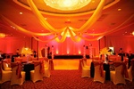 Red and gold sparkling lights illuminating a birthday celebration organized by Houston Event Planning