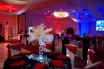 Table setting with red and white place cards for a 60th birthday party organized by Houston Event Planning