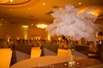 Personalized centerpieces with flowers and lighting organized by Houston Event Planning