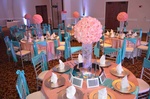 Table setting with a Quinceañera theme and floral centerpieces done by Houston Event Planning
