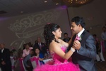 Quinceañera ceremony with the young woman dancing with her father captured by Houston Event Planning