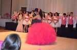 Quinceañera court performing a choreographed dance routine captured by Houston Event Planning
