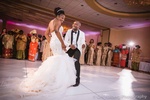 Newlyweds sharing their first dance at the wedding reception captured by Houston Event Planning