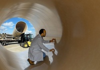 Man Inside a Pipe  - Photograph by Commercial Photographer Houston TX, Joe Robbins