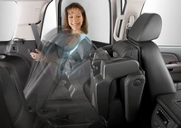 Lady pressing button to Move the car seat - Commercial Photography Texas by Joe Robbins 