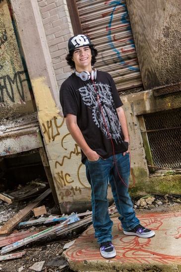 Young Man Standing with Hands in Pockets - Professional Photography Services Farmington by  Mode T Productions