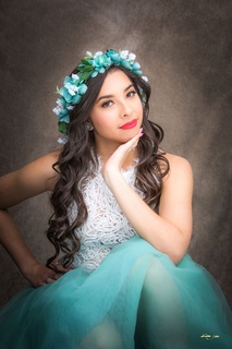 Young girl wearing blue floral tiara - Senior Pictures Albuquerque by Kim Jew