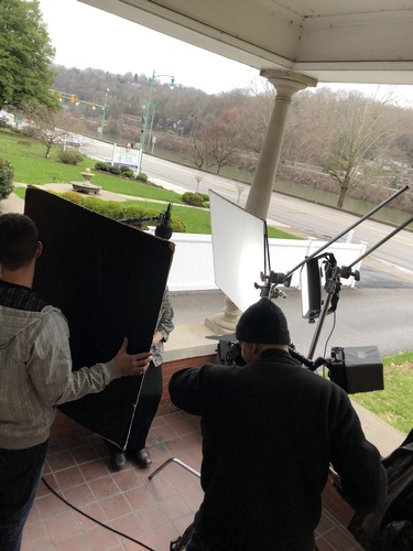 An outdoor video shoot done by Merlin Productions LLC production crew