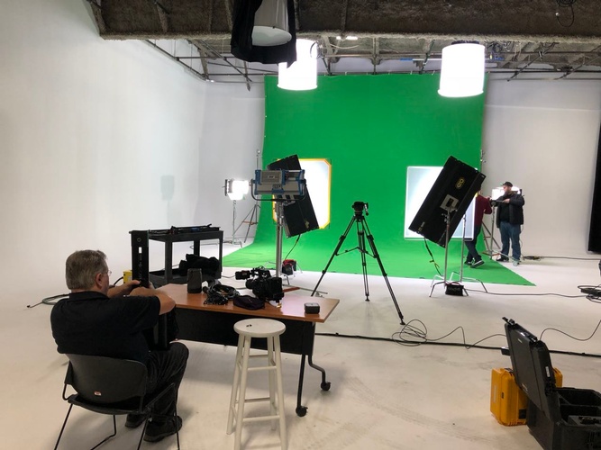 Video production on a green screen done by Merlin Productions LLC
