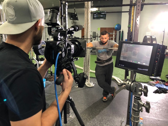 Gym video shoot of an athlete by Merlin Productions LLC 