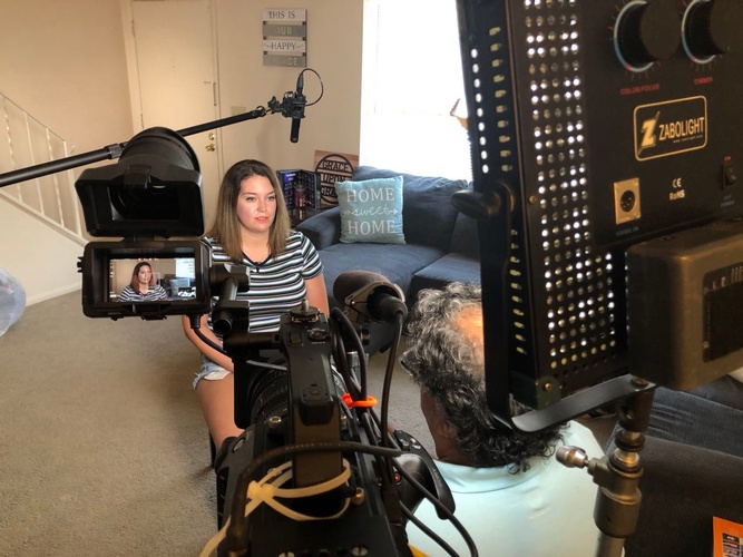 Interview of a lady at her house recorded by Merlin Productions LLC crew