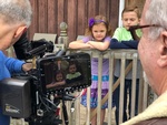 Kids being captured by Merlin Productions LLC Videographers