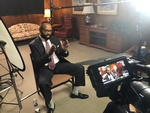 Interview of a guy in a suit shot by Merlin Productions LLC 