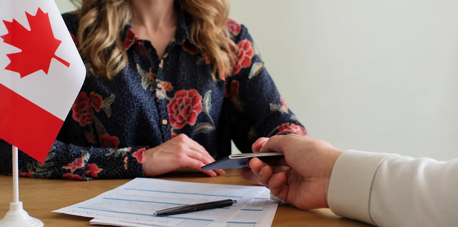Immigration lawyer in Midland assisting a client with documents