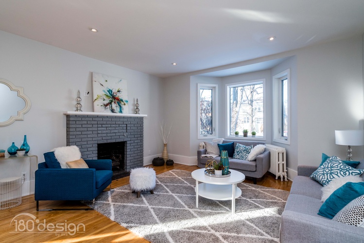 Beautiful Living Room with Fireplace designed by Canadian Staging Professional - 180 Design