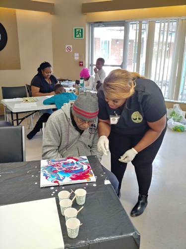 Lady Assisting old man at Art Therapy Program Vaughan by Perfect Selections Home Healthcare