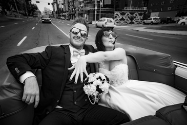 Newly Wed Couple sitting in a Car captured by Edmonton Photographer at Artistic Creations Photography and Video