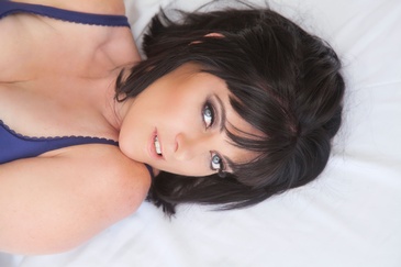 Woman lying on Bed - Glamour Photography Sherwood Park by Artistic Creations Photography and Video