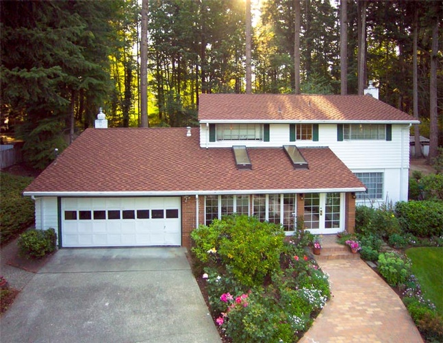 Beautiful House with a Garden - Residential Roofing Redmond by Bellevue Roofing Company, Inc