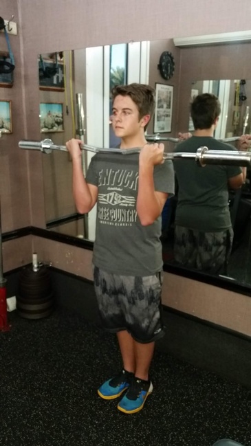 Young Boy lifting weights at The Mobile Gym - Hollywood Personal Training  Hollywood