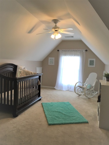 Kids Room With a Rocking Chair and Furniture - Interior Decorator Athens at Sage Key Interiors