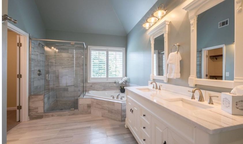 Lit Bathroom with a Shower Room and Tub  - Home Staging Services Wilson by Sage Key Interiors