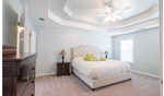 Bedroom with Soft Flooring and Furniture - Interior Decorator Buford at Sage Key Interiors