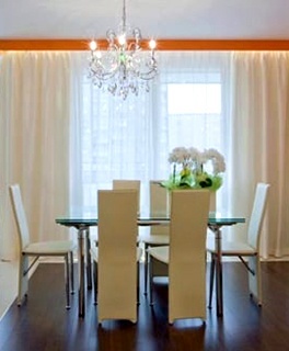 Dining Room with a Chandelier - Home Staging Winder by Sage Key Interiors