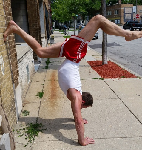 Man Balancing on Hands outside Private Fitness Studio Milwaukee, WI