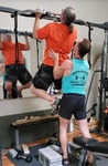 Squat Training by Personal Trainer at Private Fitness Studio in Milwaukee