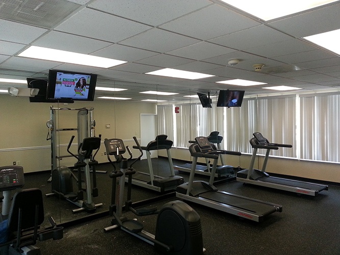 Flat Panel TV Installation in Gym by CEDIA Certified Technician in Frederick, MD at Nerical LLC
