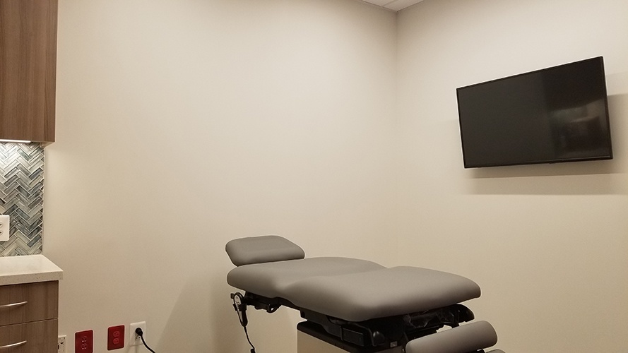Flat Panel TV Installation in Clinic by Nerical LLC - CEDIA Certified Technician in Frederick