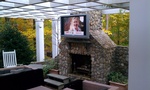 Wall Mounted Flat Screen TV above Fireplace by Frederick CEDIA Certified Technician - Nerical LLC