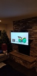 Flat Screen TV Wall Mounted above Fireplace by CEDIA Certified Technician in Frederick