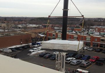 Crane Unloading Equipment on a Terrace - Industrial HVAC Services GTA by Thermokline Mechanical