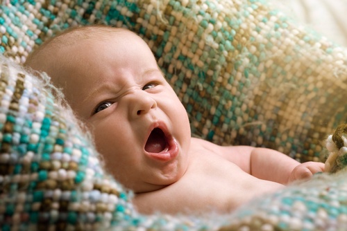 Baby Yawning in a Cradle - Baby Photography Barrie by Matt Tibbo