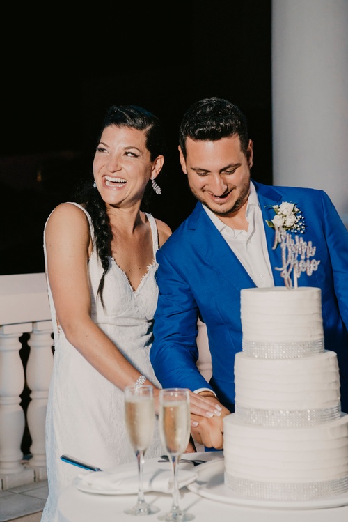 Newly Wed Couple Captured by Matt Tibbo While Cutting the Wedding Cake - Wedding Photographer Milton