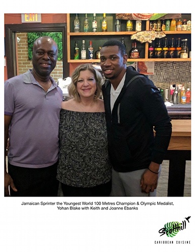 Jamaican Sprinter the Youngest World 100 Metres Champion and Olympic Medalist, Yohan Blake with Keith and Joanne Ebanks