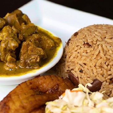 Jamaican-style rice and peas, a staple side dish bursting with flavor at Scotthill Caribbean Cuisine