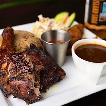 Jamaican Pork Ribs, savory filled with vegetables and spices at Scotthill Caribbean Cuisine