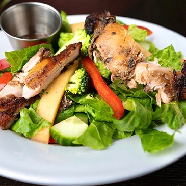 Spicy and hearty Jamaican-style chicken, perfect for warming up on a chilly day at Scotthill Caribbean Cuisine