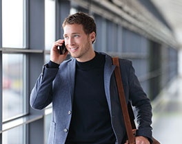 Handsome Man Speaking on a Smartphone - Cellphone Store Etobicoke - TECH ZONE